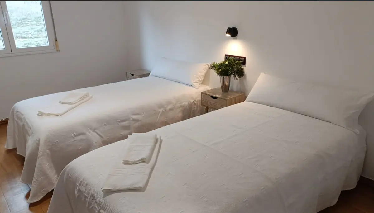 Habitación con dos camas individuales del Hotel Rural